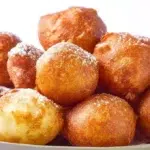 Puff puff fried dough balls with a golden crispy exterior and soft fluffy center