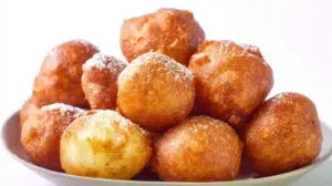 Puff puff fried dough balls with a golden crispy exterior and soft fluffy center