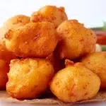 akara recipe crispy golden nigerian black eyed pea bean fritters on paper towel with red pepper sauce agege bread and fresh habanero pepper