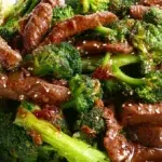 Beef and broccoli stir-fry made with tender slices of beef, crisp broccoli florets, and a glossy savory sauce.