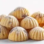 Lebanese maamoul date cookies filled with sweet date paste and decorated with traditional carved patterns.