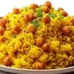 Lebanese turmeric rice with chickpeas served with fluffy golden rice, tender chickpeas, and fresh herbs.